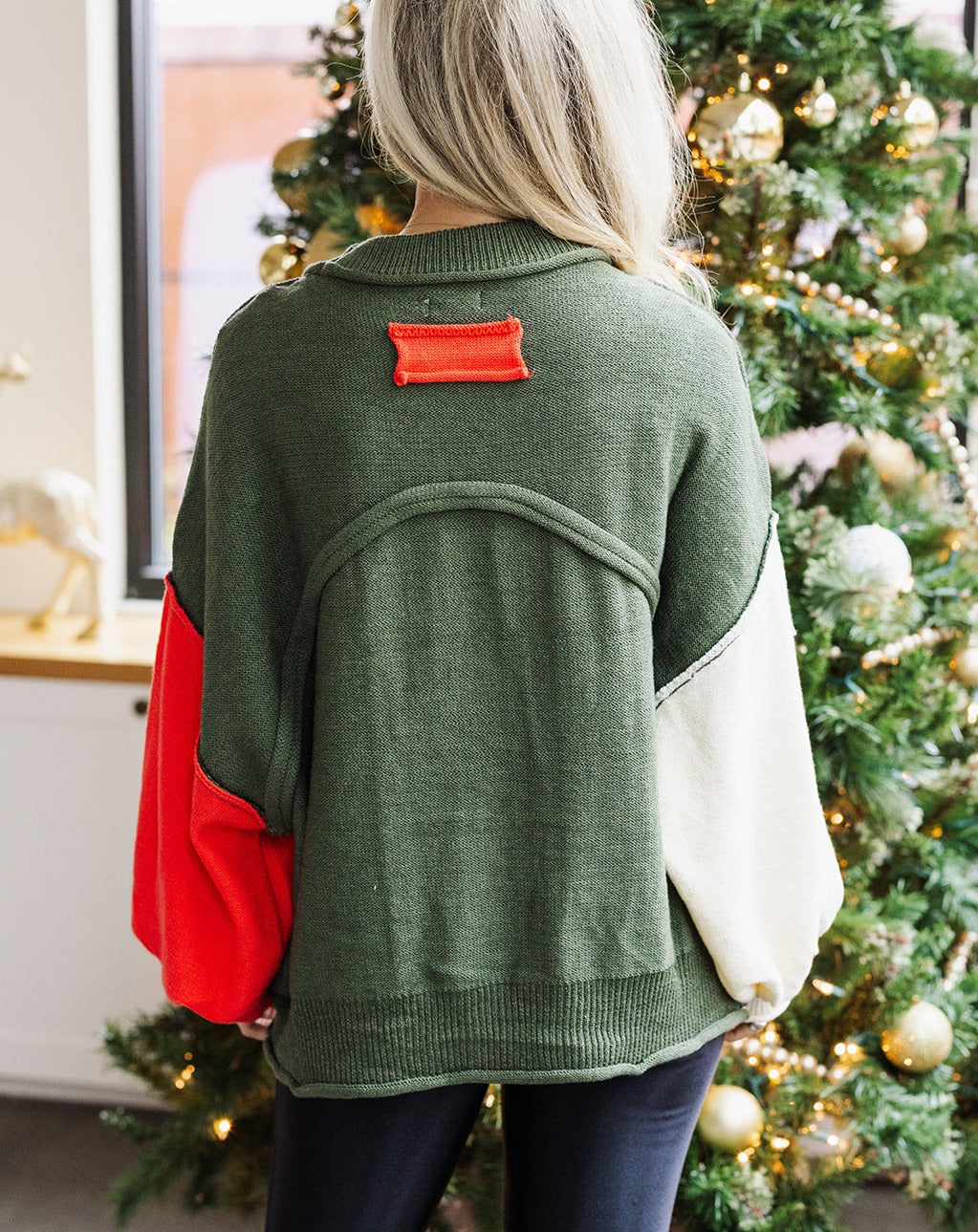Rudolph's Red, Green, and White Colorblock Sweater